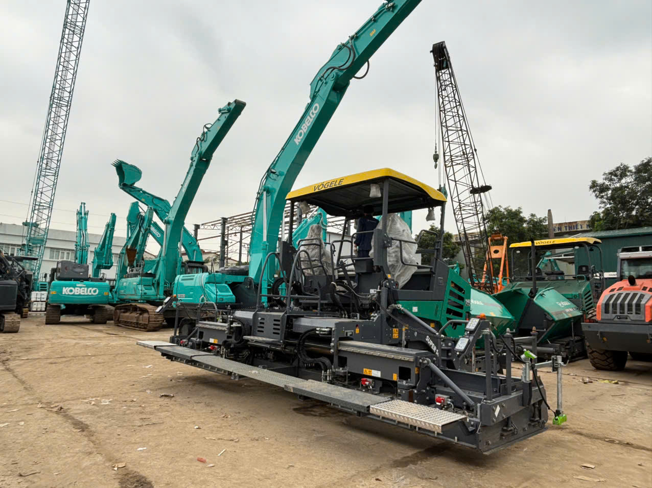 giá máy rải thảm Vögele SUPER 1400 thực tế